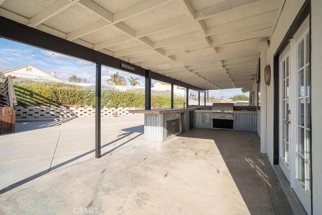 view of patio with a grill and an outdoor kitchen