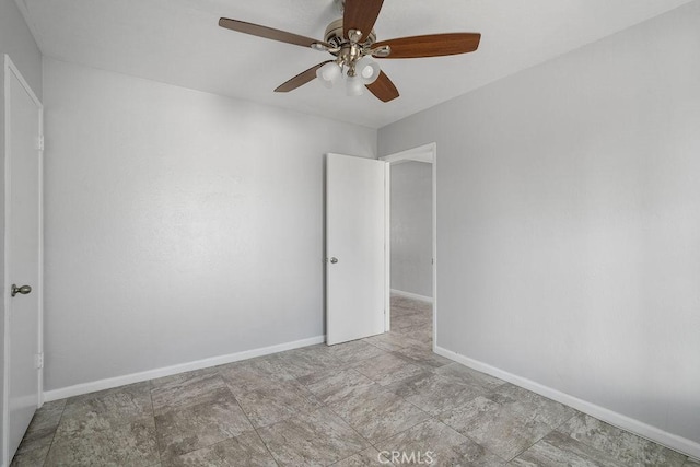 unfurnished room with ceiling fan