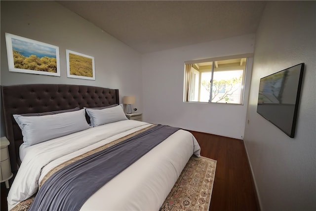 bedroom featuring dark hardwood / wood-style floors