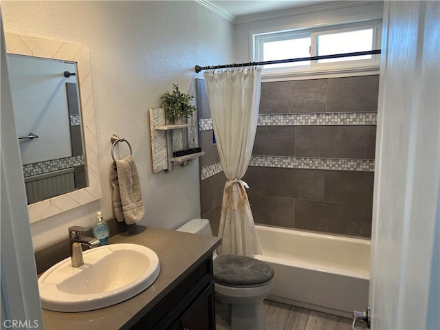 full bathroom featuring shower / tub combo, vanity, crown molding, wood-type flooring, and toilet