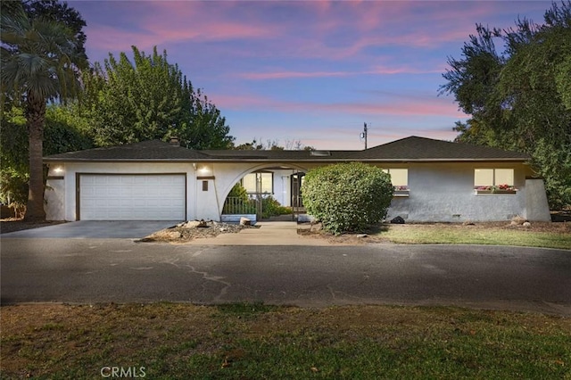 ranch-style home with a garage