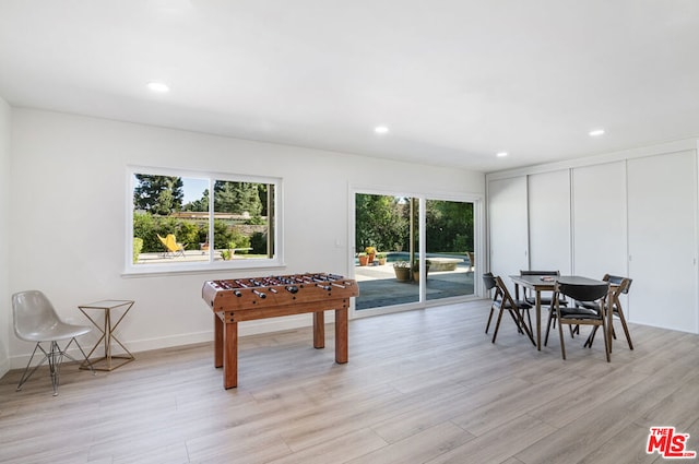 game room featuring light hardwood / wood-style flooring