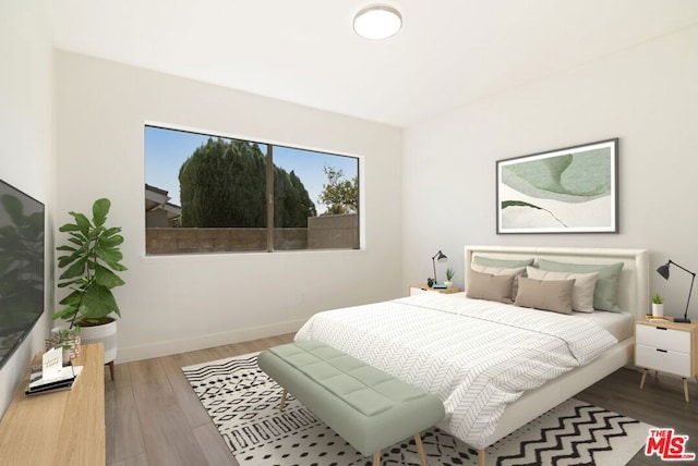 bedroom featuring hardwood / wood-style floors