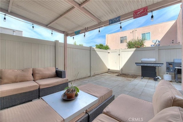 view of patio featuring an outdoor living space and grilling area