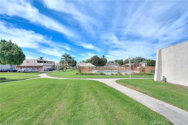 view of yard with a swimming pool