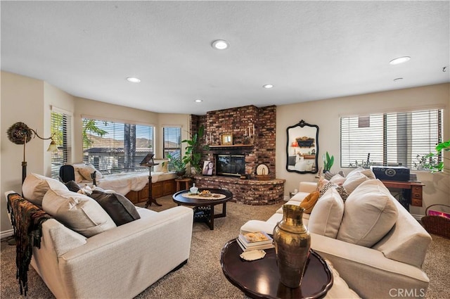 carpeted living room with a fireplace