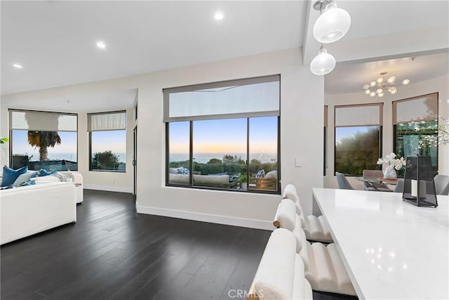 interior space with dark wood-style flooring, recessed lighting, and baseboards