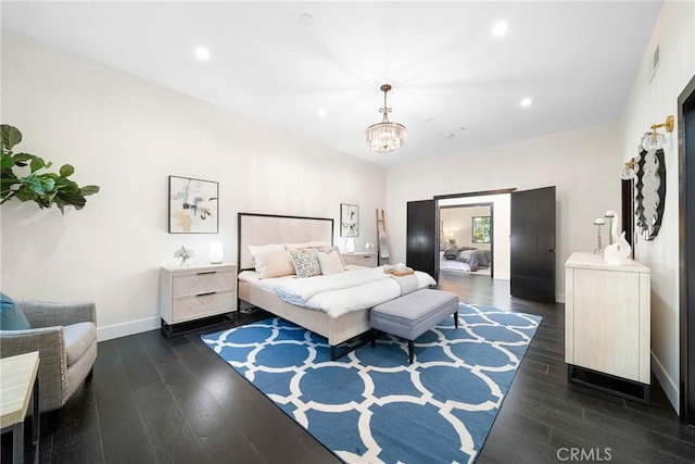 bedroom featuring baseboards, visible vents, dark wood-type flooring, a chandelier, and recessed lighting