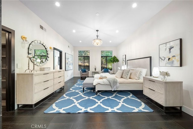 bedroom featuring baseboards, dark wood-type flooring, visible vents, and recessed lighting