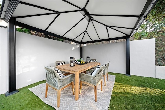 view of patio / terrace with a gazebo and outdoor dining area