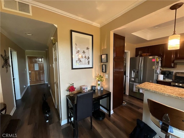 kitchen with dark brown cabinetry, dark hardwood / wood-style flooring, pendant lighting, appliances with stainless steel finishes, and ornamental molding