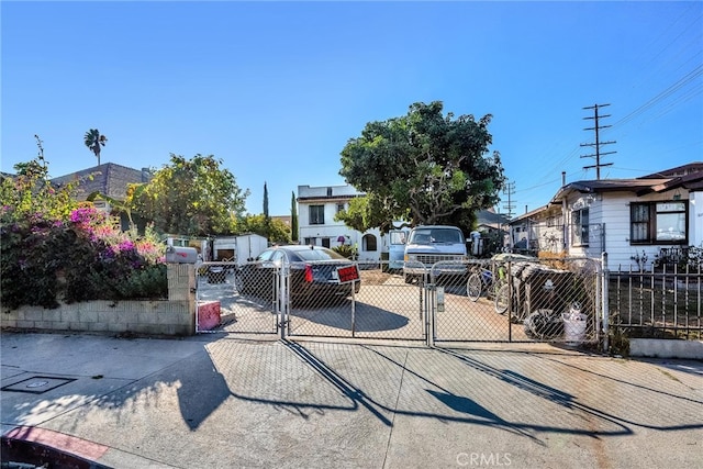 view of front of house featuring a gate and fence