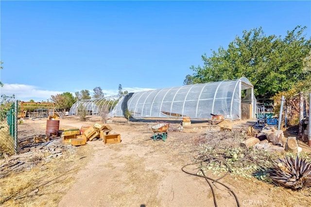 view of yard with an outdoor structure