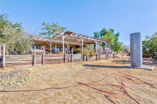 11507 Savage Ln, Apple Valley, CA 92308 - back of house featuring an exterior structure and an outdoor structure