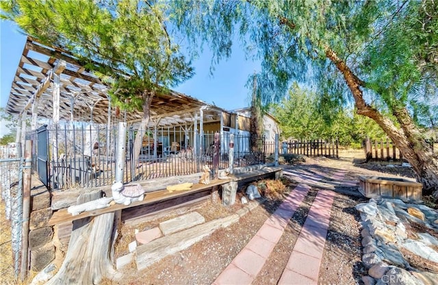 wooden deck featuring a pergola