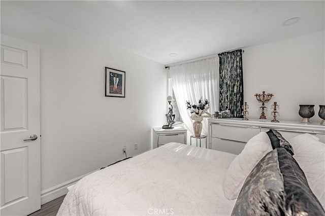 bedroom featuring hardwood / wood-style floors