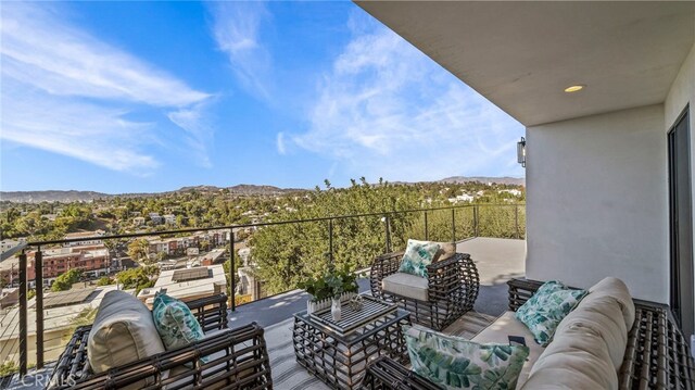 balcony featuring an outdoor hangout area