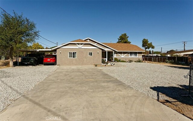 view of front of house featuring a carport