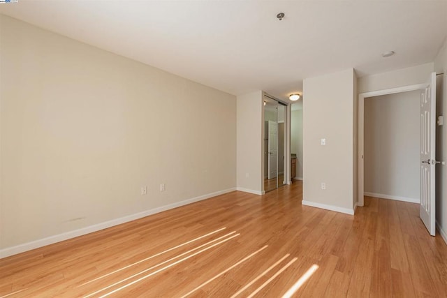 unfurnished bedroom featuring light hardwood / wood-style floors