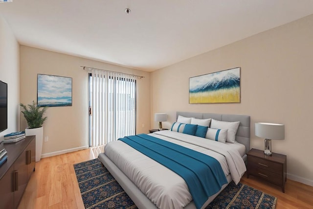 bedroom with light hardwood / wood-style flooring