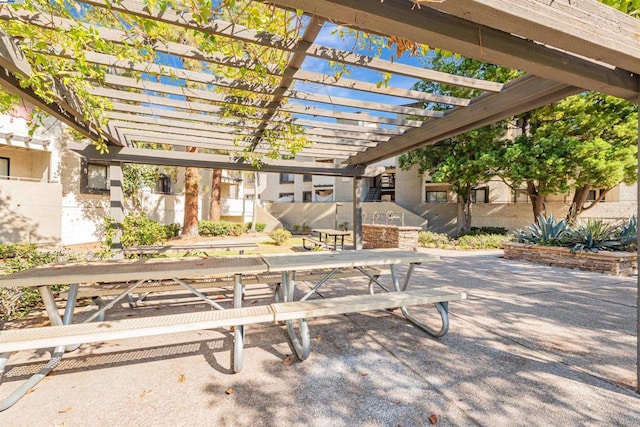 exterior space featuring a pergola