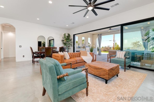 living room featuring ceiling fan