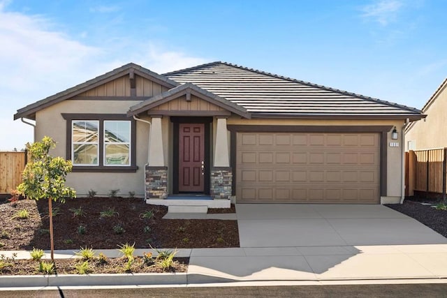 view of front of property with a garage