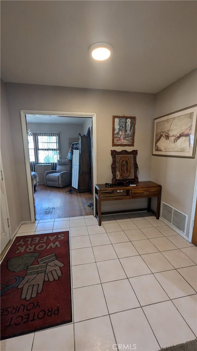 hallway featuring light hardwood / wood-style flooring