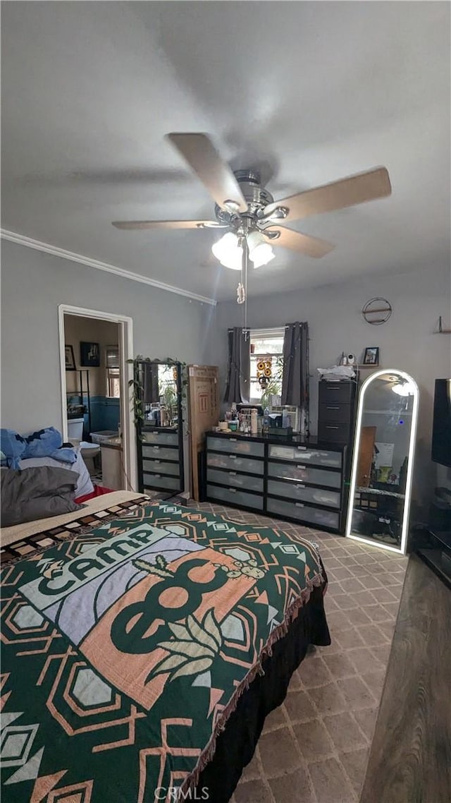 bedroom with hardwood / wood-style flooring, ceiling fan, and ornamental molding