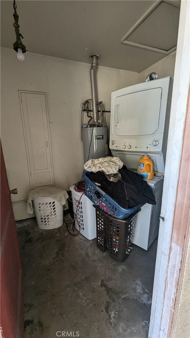 laundry room with stacked washer / drying machine and gas water heater