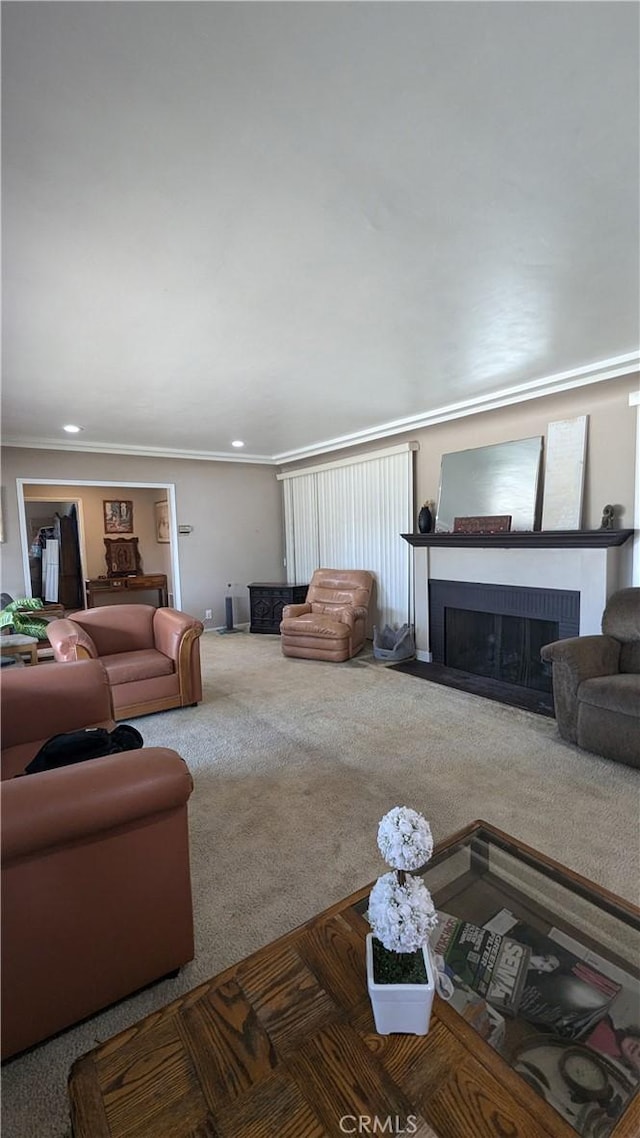 living room with carpet flooring and crown molding