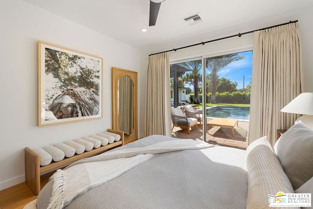 bedroom with ceiling fan, access to exterior, and hardwood / wood-style floors