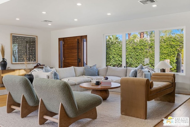 living room with light hardwood / wood-style floors