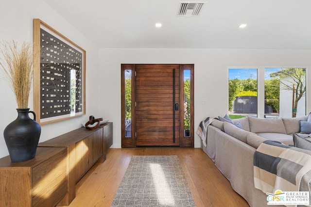 foyer with light hardwood / wood-style flooring