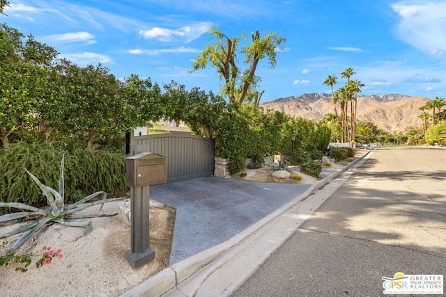 view of front of property with a mountain view