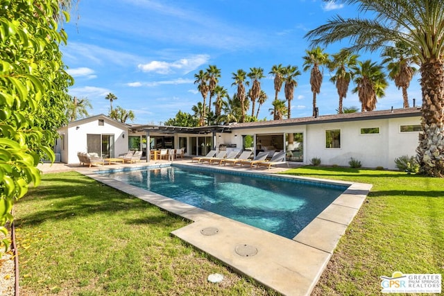 view of swimming pool with a pergola, a lawn, and a patio