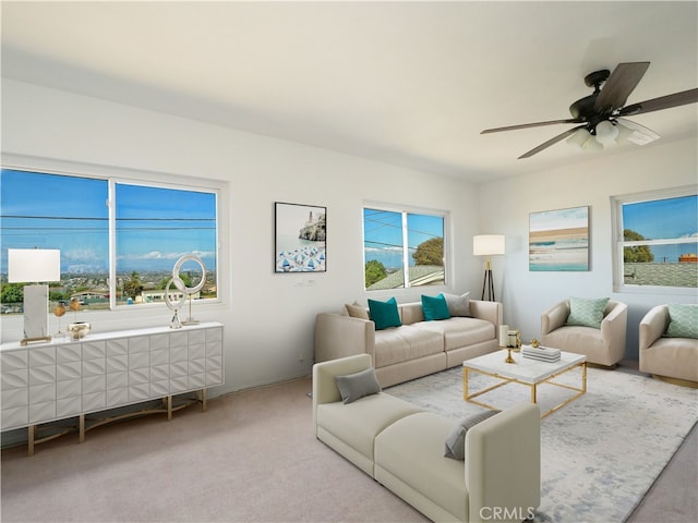 living room featuring carpet floors and ceiling fan