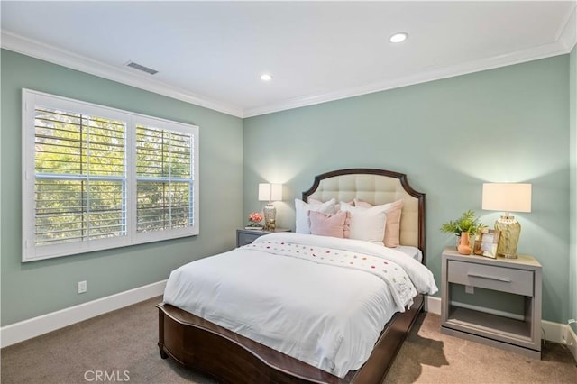 bedroom with carpet flooring and crown molding