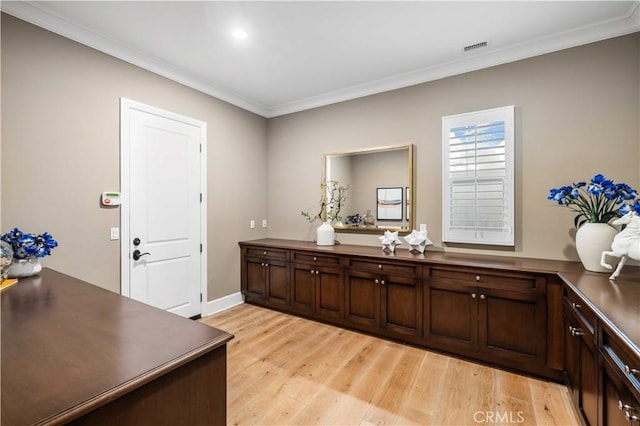 interior space featuring light hardwood / wood-style flooring and ornamental molding