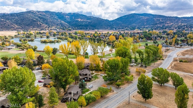 bird's eye view featuring a water and mountain view