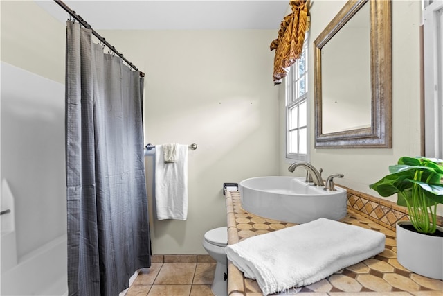 bathroom featuring vanity, toilet, tile patterned floors, and a shower with shower curtain