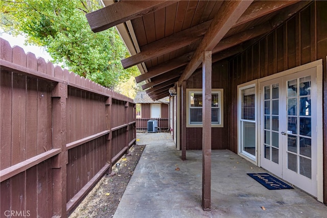 view of patio with french doors and central AC unit