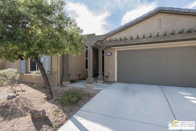 view of front of home with a garage