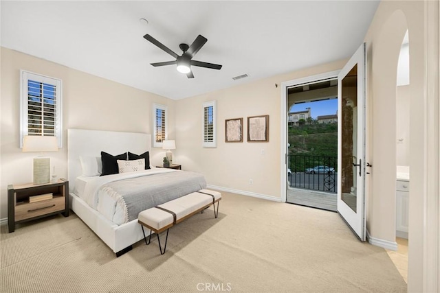 carpeted bedroom with access to exterior and ceiling fan