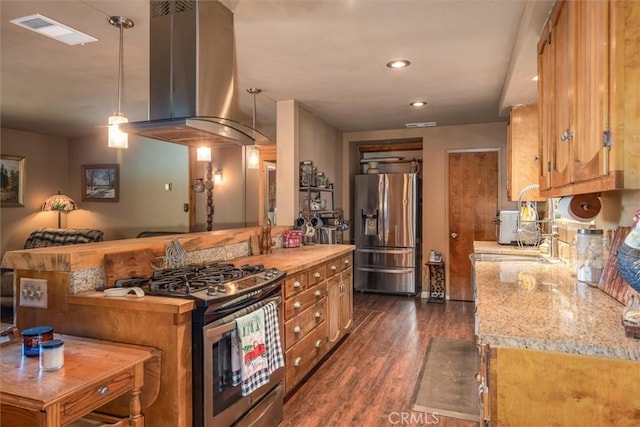 44739 Rd 619, Ahwahnee, CA 93601 - kitchen featuring dark wood-type flooring, stainless steel appliances, light stone counters, island range hood, and kitchen peninsula
