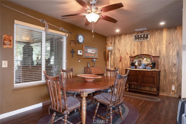 44739 Rd 619, Ahwahnee, CA 93601 - dining space featuring dark hardwood / wood-style flooring, ceiling fan, and wood walls