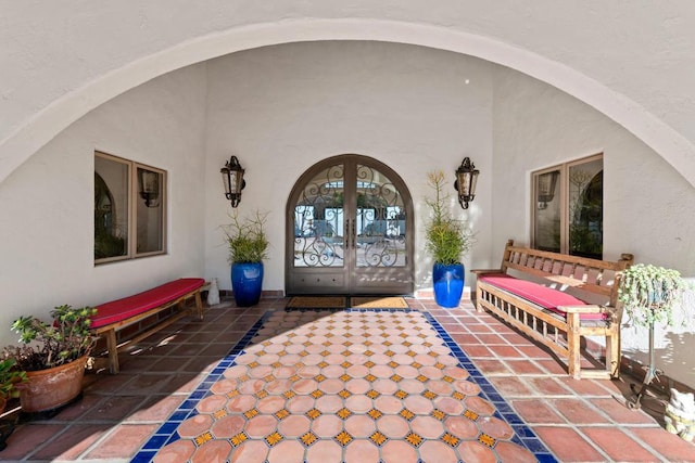 interior space with french doors and a patio