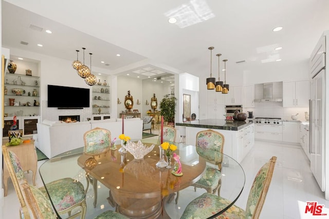 tiled dining space with built in shelves