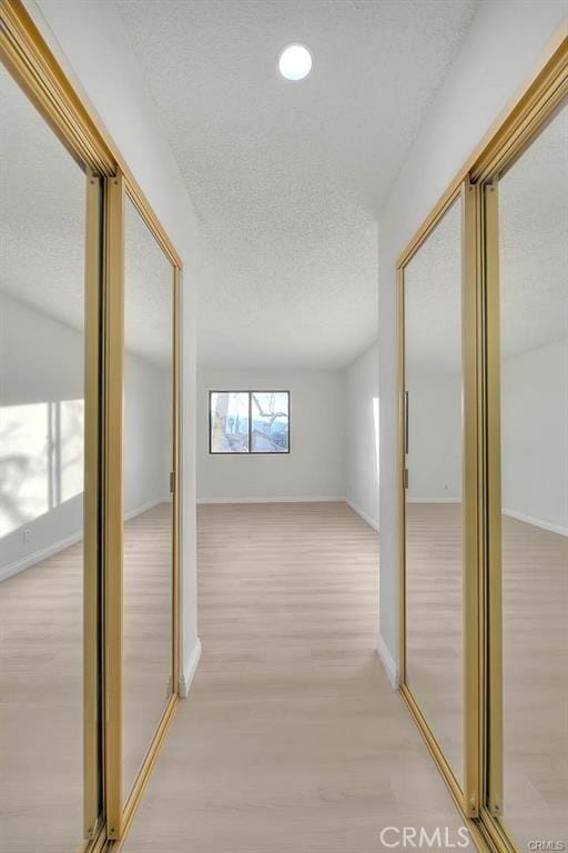 460 Oak St Unit 201, Glendale, CA 91204 - hall featuring light wood-style flooring, a textured ceiling, recessed lighting, and baseboards