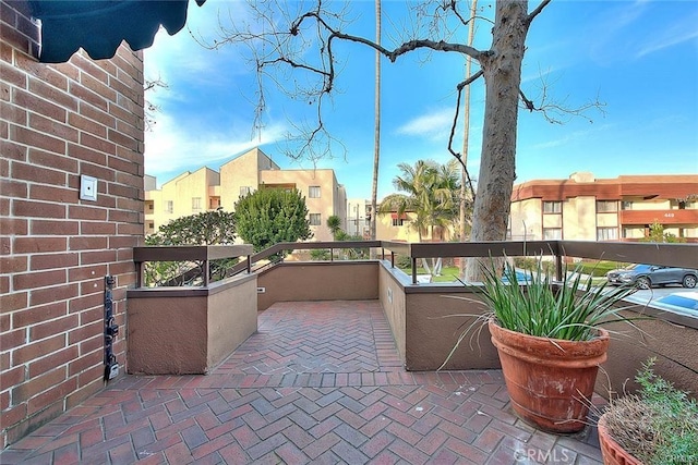 460 Oak St Unit 201, Glendale, CA 91204 - view of patio featuring a balcony and a residential view